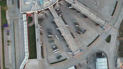 Aerial-Drone-Shot-of-Buses-In-The-Bus-Stand-In-Chennai-City-India