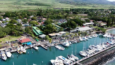 drone parallax around lahaina wharf harbor in maui on a sunny day