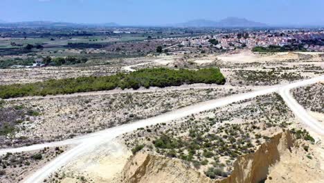 aerial rocky spanish coastline and san fulgencio near