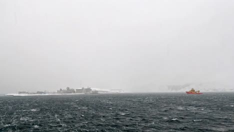 rough seas in winter. snow storm at sea