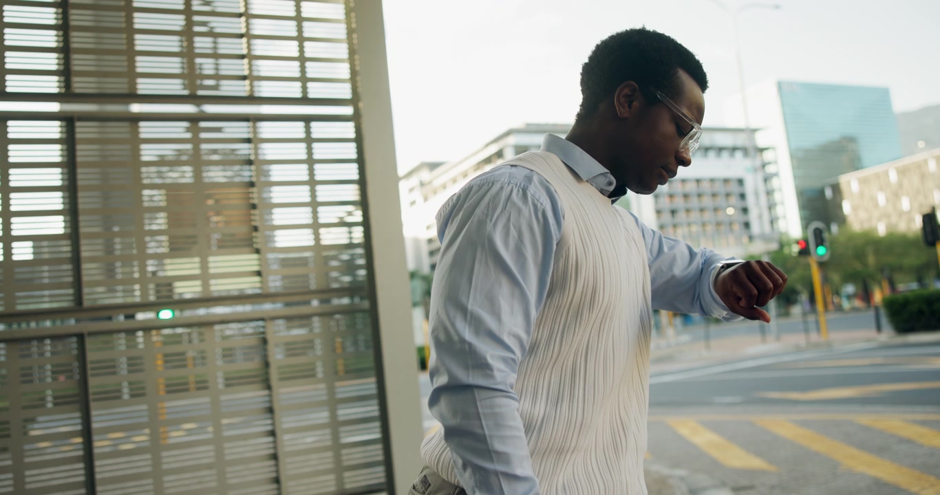 Young Professional Man Waiting at City Bus Stop