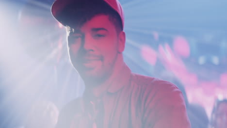 man at a nightclub party