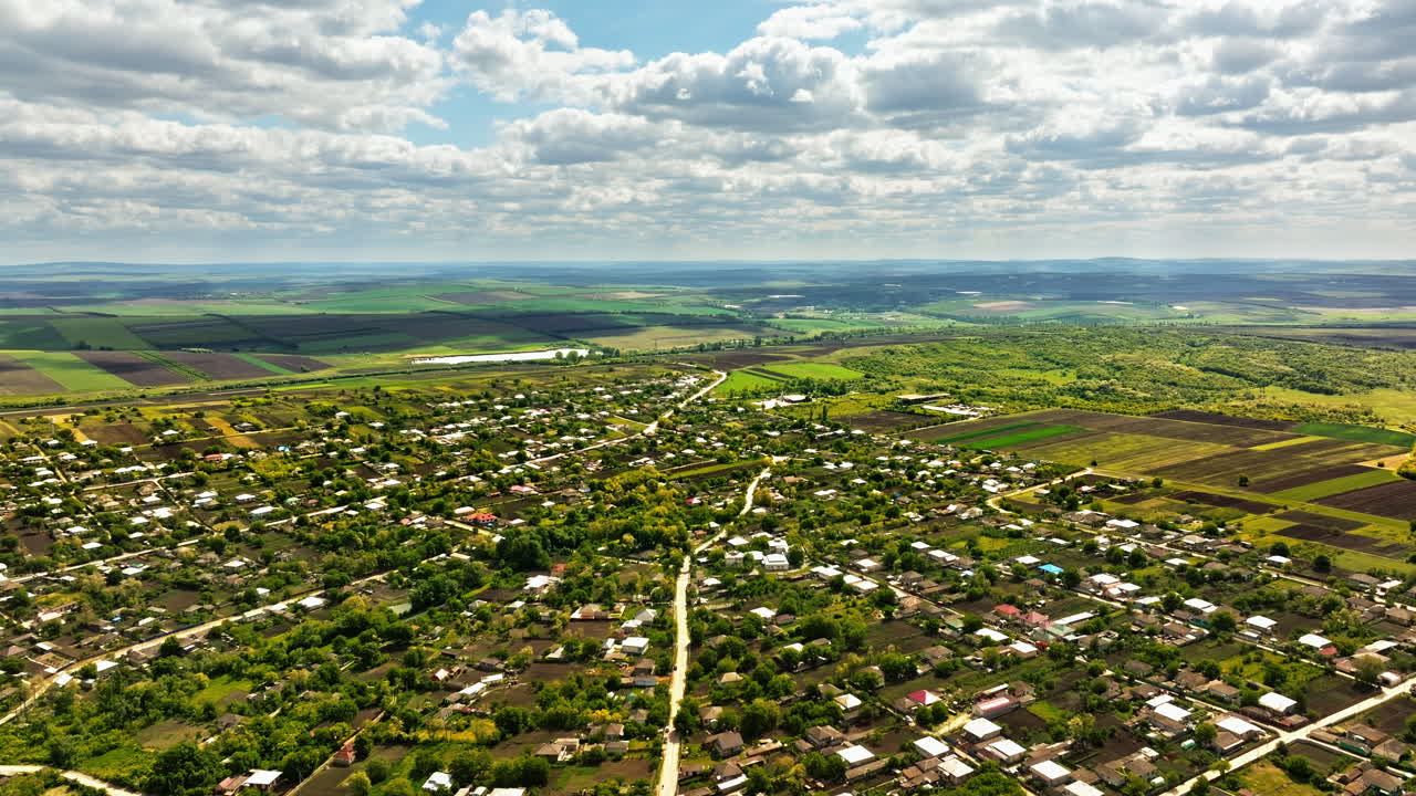 Aerial drone view of Pelinia, Drochia, Moldova with a cloudy sky