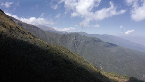 Mount-Cangshan-mountainside-landscape-in-Yunnan-China,-cloudy-aerial-view