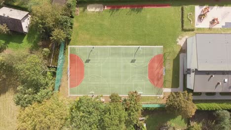 Top-down-aerial-shot-of-a-multifuncional-field-and-playground