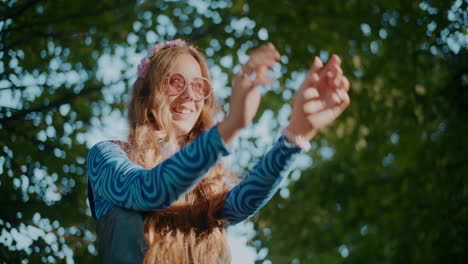 young woman enjoying the outdoors in hippie style