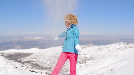 happy adult in ski clothes waving arms