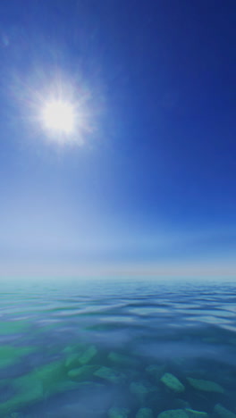 beautiful blue ocean with sun in the sky