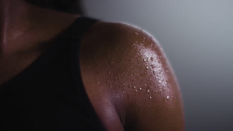 close up shot of beads of sweat on woman wearing gym fitness clothing exercising 4