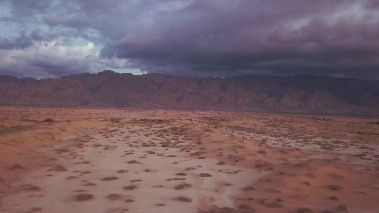 Israel Aerial Drone Of Middle Eastern Camel Owners In Desert Convoy Tourism