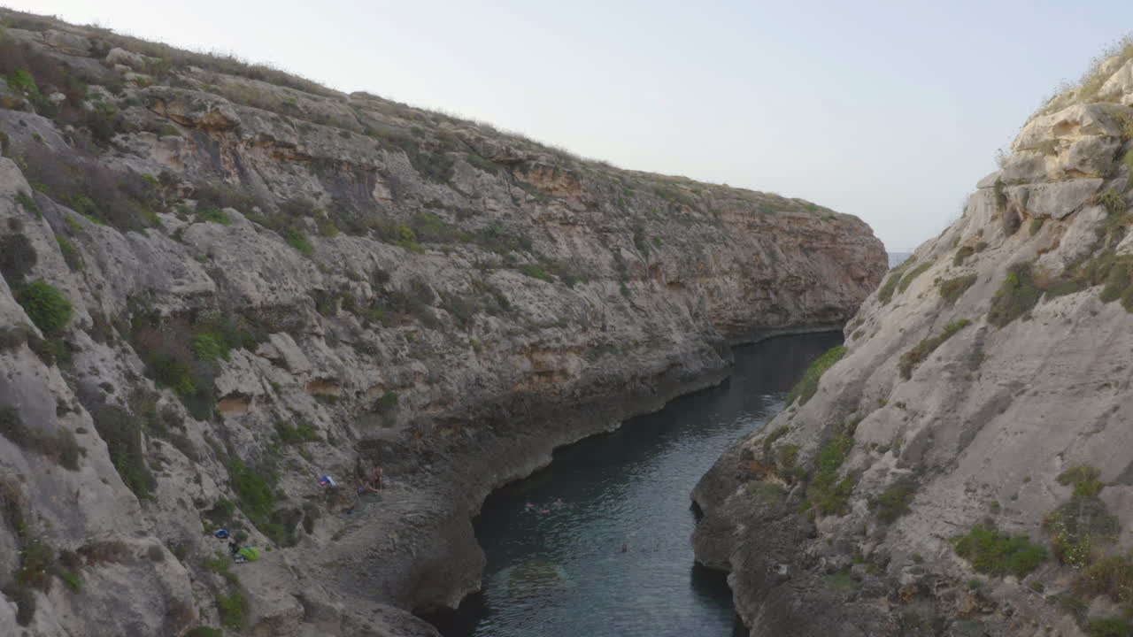 Stone walls of the Wied il-Għasri sea canyon valley,Malta,aerial shot