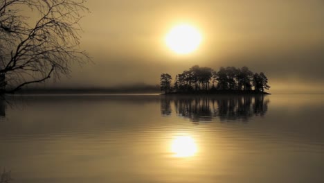 small island on calm waters of lake