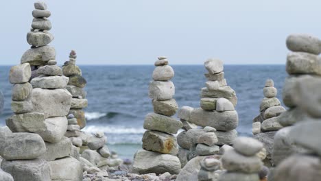 relaxing view of piled stones next to the ocean, loopable clip