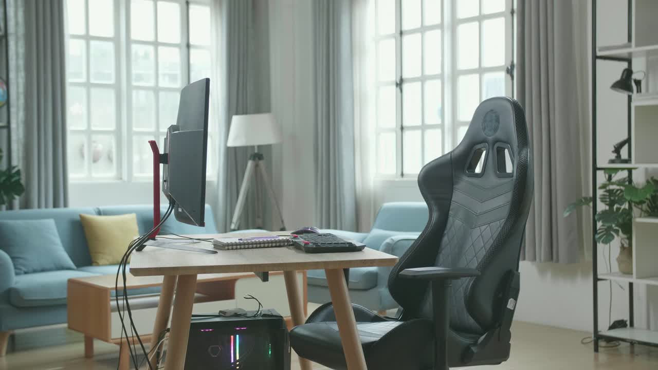 Desktop Computer On A Table With A Chair In The Working Room At Home.