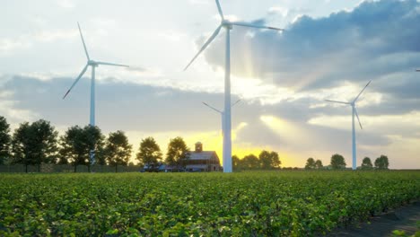 wind turbines standing in sunset. farm with wind turbines. generating clean renewable energy. bright orange sunset. alternative energy