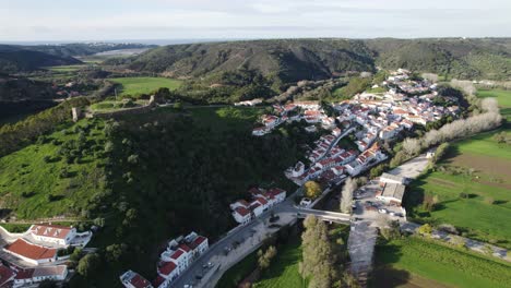 entrance to the city of aljezur in portugal, castle on top of the hill, clifftop landscapes