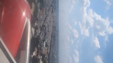 Landung-In-Ho-Chi-Minh-Stadt,-Blick-Aus-Dem-Flugzeugfenster,-Vertikal