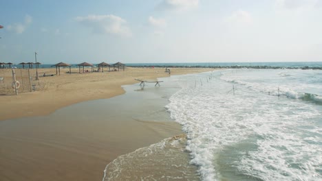 view drom drone of sea coast and tourists on beach