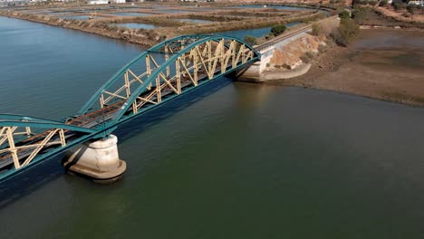 ariel view of beautiful bridge over river  dolly-out