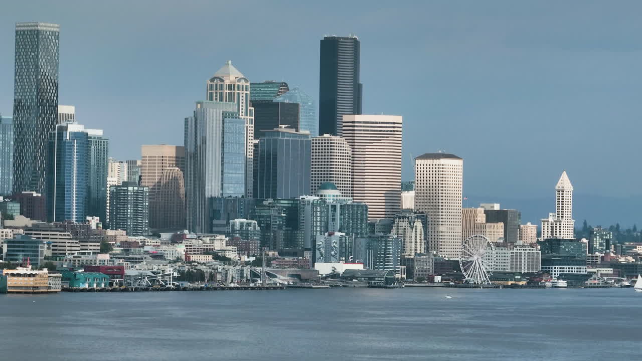 Telephoto drone shot in front of downtown Seattle, sunny day in WA, USA