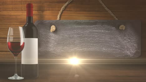 animation of lights over bottle and glass of red wine over wooden background with tag