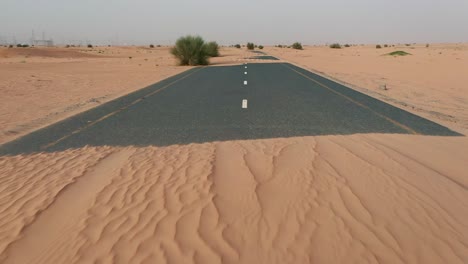 4k drone footage, aerial view of dry desert in dubai with sand ripples, geological landscape of high dune desert in united arab emirates, drone videos