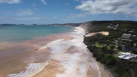 pacific ocean stirred up after a cyclone large muddy waves