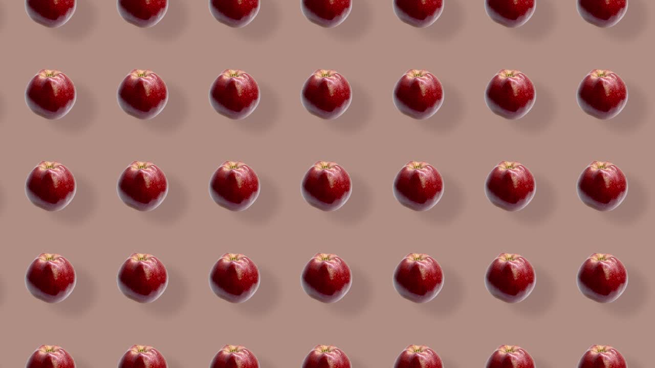 신선한 사과의 다채로운 패턴.  뷰. 사과와 함께 완벽한 패턴. 포프 아트 디자인. 현실적인 애니메이션. 4k 비디오 모션.