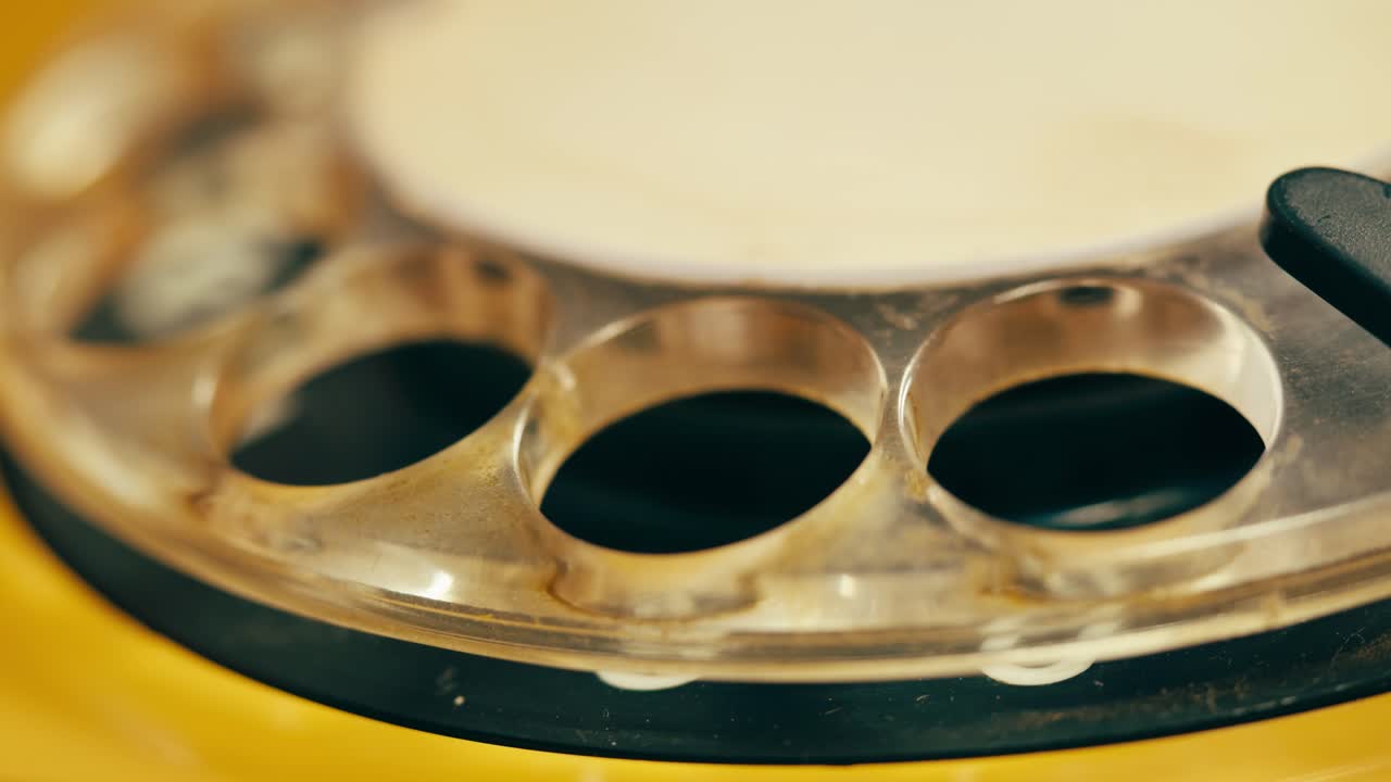 Retro vintage phone, A yellow rotary telephone is displayed on a wooden desk, adding a nostalgic touch
