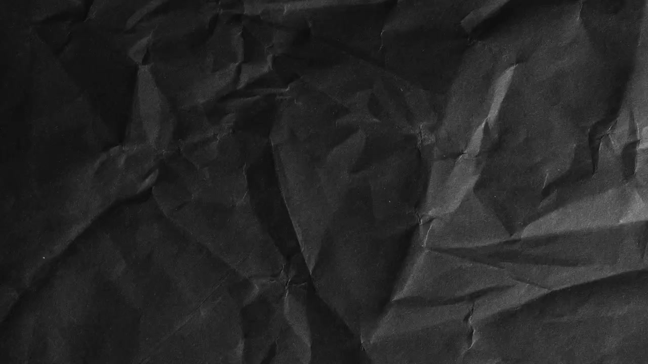 Animated Crumpled Black Paper Texture Background Loop