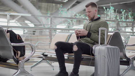 man waiting at the airport