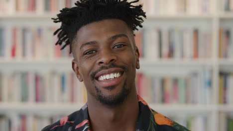 close up confident african american man student laughing successful black male funky hairstyle looking happy expression slow motion