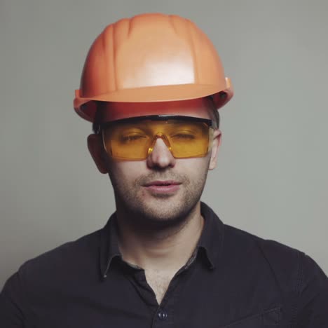 portrait of young engineer with helmet