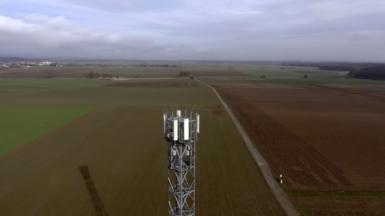 Aerial View of a Cell Tower in a Rural Farmland