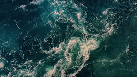 Waves-of-water-of-the-river-and-the-sea-meet-each-other-during-high-tide-and-low-tide.