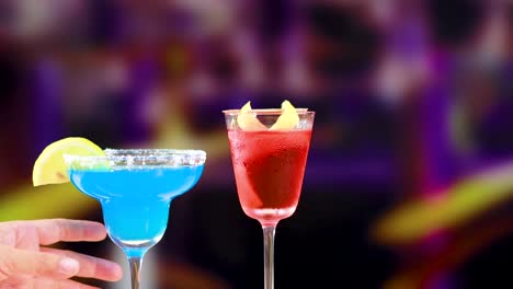 two cocktails, a blue lagoon and a negroni, are presented in a lively bar with vibrant lighting and dynamic camera movement