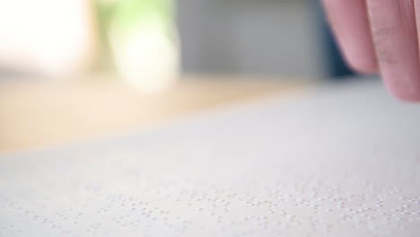 Close-Up-Of-An-Unrecognizable-Blind-Man-Reading-A-Braille-Book-2