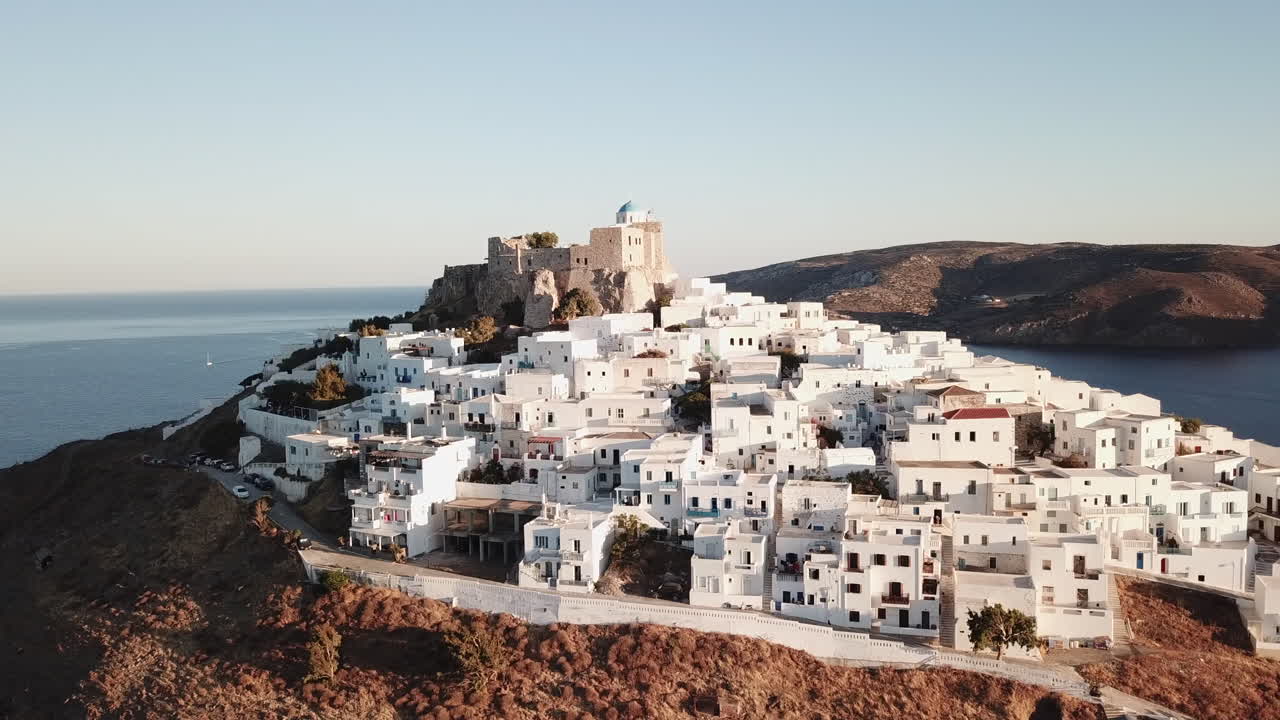 Aerial View of a Picturesque Greek Island Village with a Castle