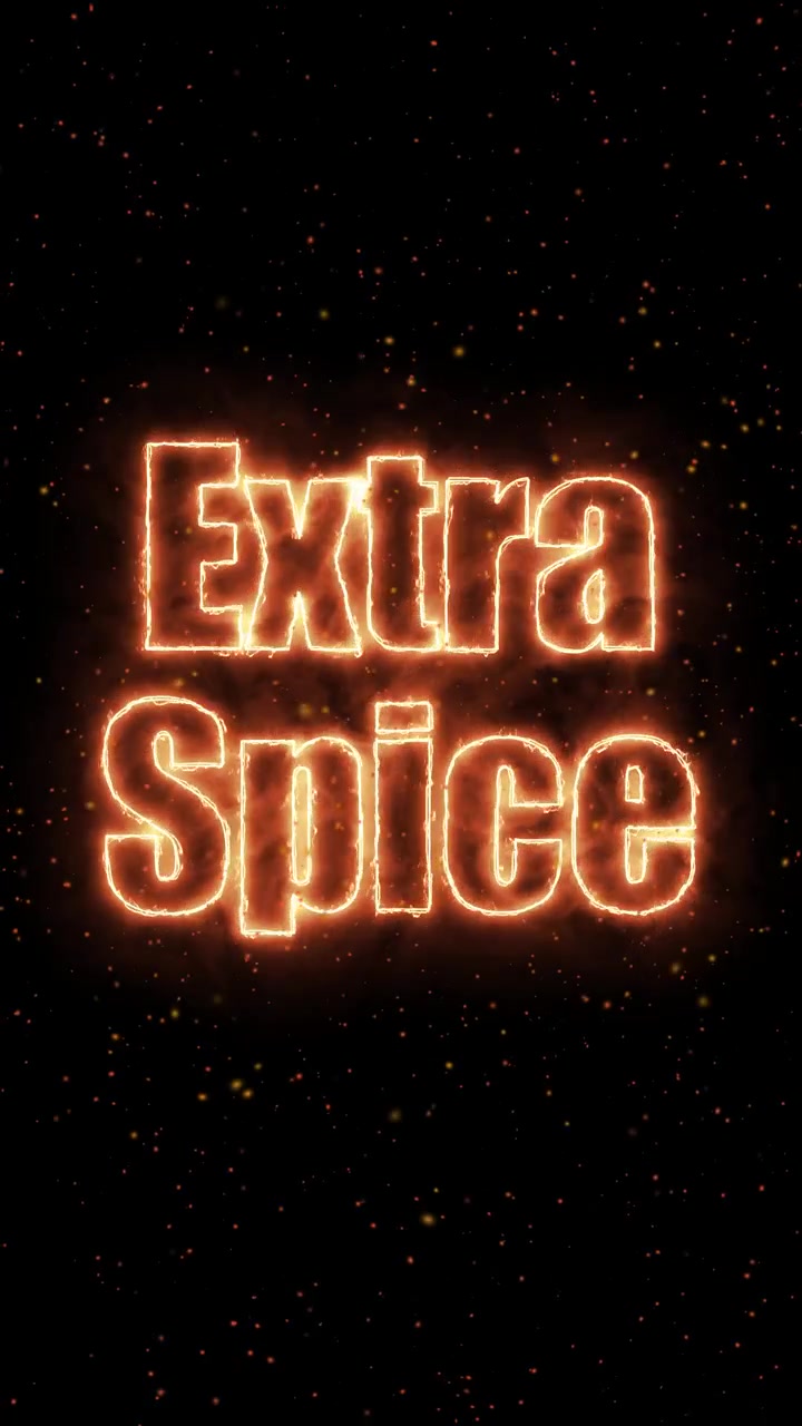 Vertical motion graphics animation of glowing fiery text with floating embers on black background