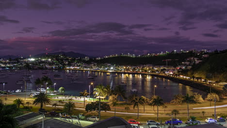 hermoso atardecer a la noche timelapse del tráfico de noumea alrededor de la bahía de orphelinat