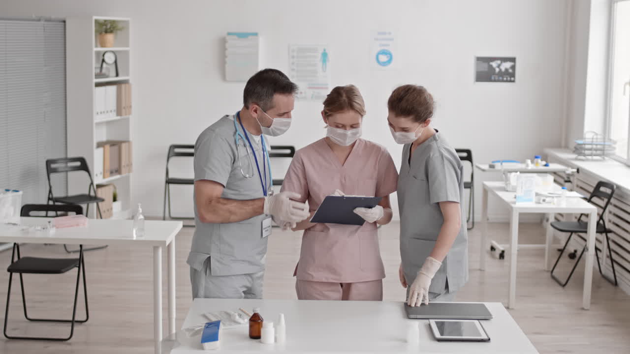 Doctors Talking in Hospital in Morning