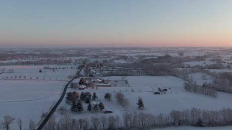 Dolly-Forward-over-a-Snow-Covered-Countryside-before-Sunrise