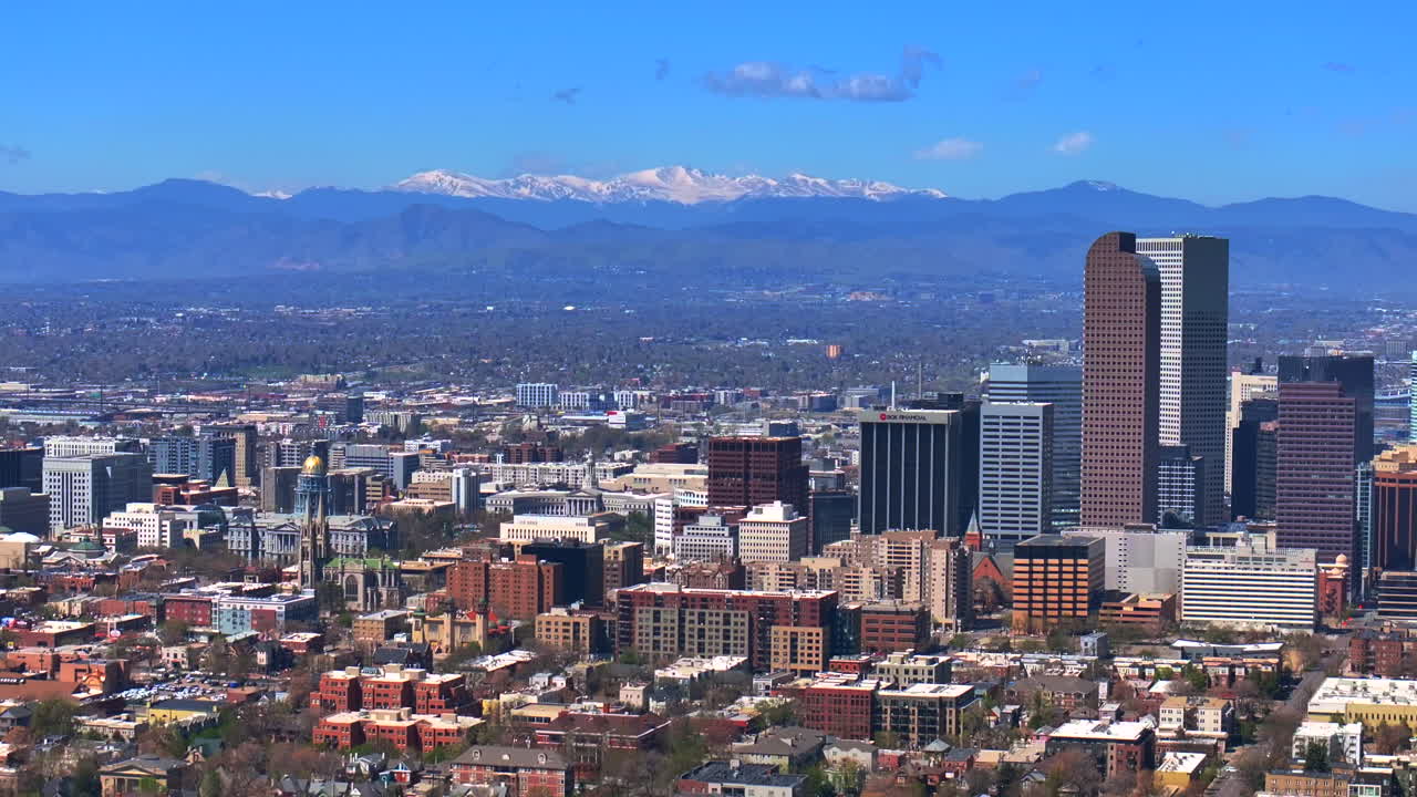 Mount Blue Sky City Park Lodo Downtown Denver Cityscape Landscape Colorado aerial drone view tall skyscraper buildings city living apartments spring summer front range mountains parallax right circle