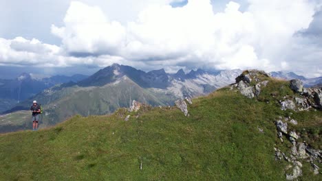 hiking the austrian alps on a summers day along ridges and around mountain huts