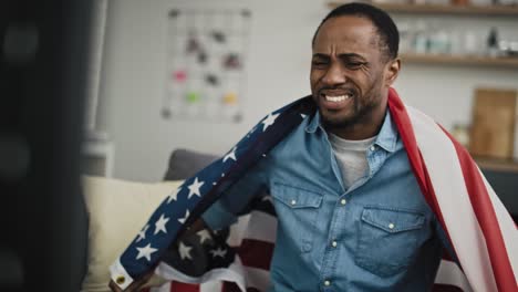 video of extremely dissatisfied man watching  tv of usa election