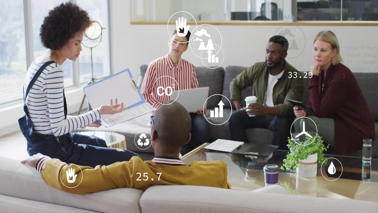 Presenter flipping and gesturing causing CO2 charts and icons showing sustainability data for team