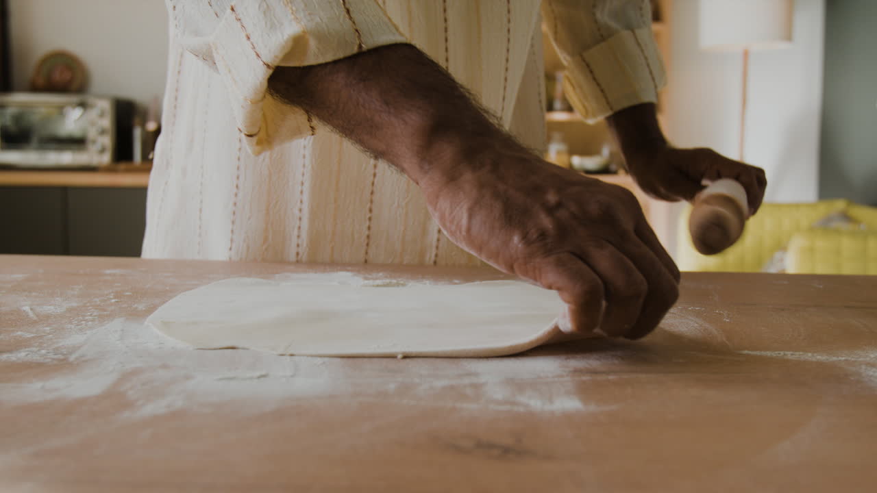 Man Making Flatbread at Home