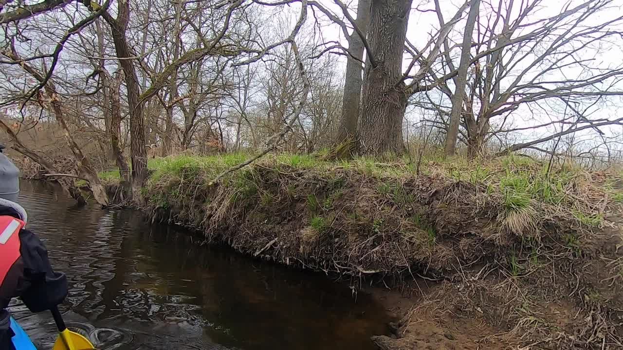 POV: Couple canoeing in autumn