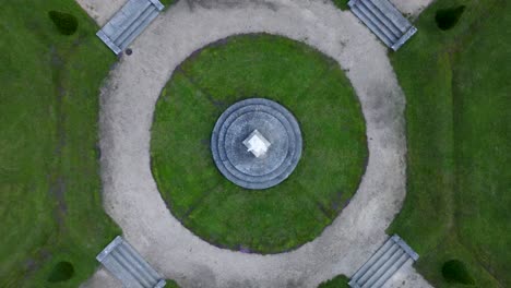 zenital view of a garden statue, paths around