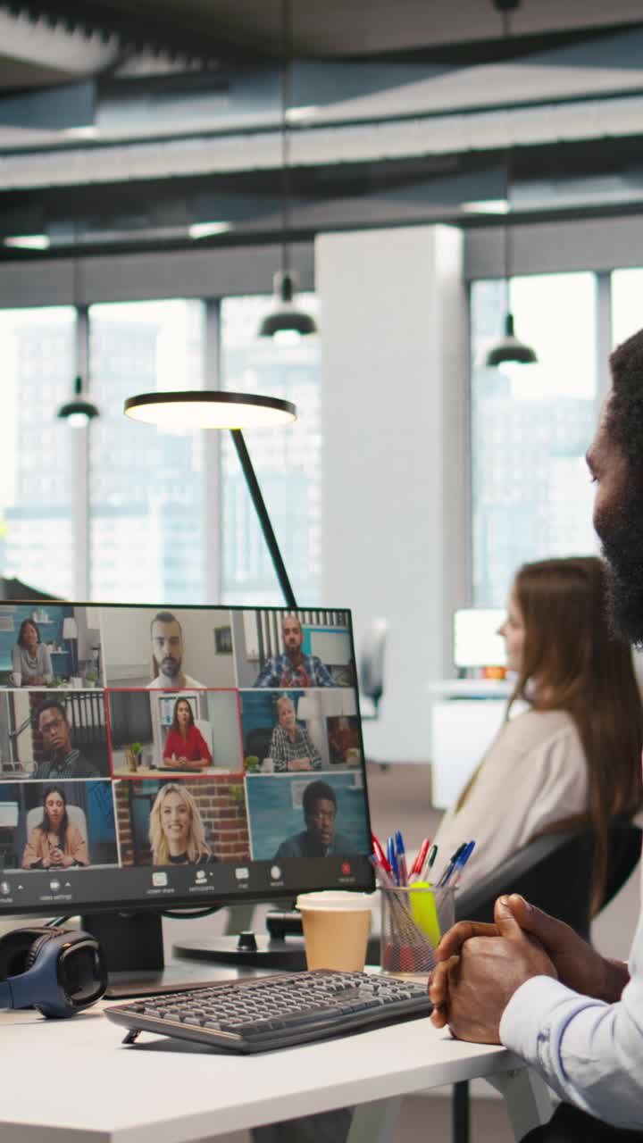 Vertical video Tech startup office team collaborating via videocall, doing brainstorming